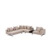 A glamorous sand-coloured corner sofa with contrasting black legs