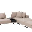 A glamorous sand-coloured corner sofa with contrasting black legs