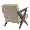 A chic, tan-toned leather armchair with contrasting dark brown x-shaped legs
