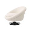 A luxurious contemporary swivel chair with boucle upholstery and a nickel swivel base