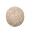 A luxurious spherical cushion in canberra sand upholstery 