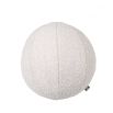 A luxurious small round boucle cushion 