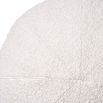 A luxurious large round boucle cushion 