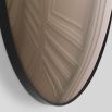 A luxurious brown-tinted convex mirror with a defining black rim