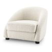Luxurious boucle cream armchair with sloped arms by Eichholtz