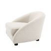 Luxurious boucle cream armchair with sloped arms by Eichholtz