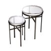 A stylish 2 piece set of side tables in a bronze finish by Eichholtz