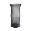 A luxurious handblown grey-tinted glass vase