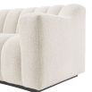 A luscious fluted contemporary sofa with boucle upholstery