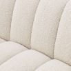 A luscious fluted contemporary sofa with boucle upholstery