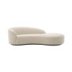 A sophisticated, curvaceous and asymmetric natural linen sofa by Eichholtz 