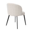 A beautiful set of dining chairs with a stunning boucle cream upholstery and black tapered legs 