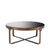 An industrial décor inspired coffee table in a copper finish and a black glass top.
