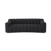 A stunning contemporary black boucle sofa