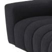 A stunning contemporary black boucle sofa