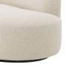 A fabulous asymmetrical boucle sofa