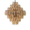 A gorgeous diamond shaped chandelier with antiqued brass and gold glass.