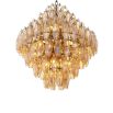 A gorgeous diamond shaped chandelier with antiqued brass and gold glass.
