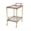 Two-tiered drinks trolley in a tan leather and antiqued brass finish.