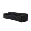A stunning deep-channelled black boucle sofa