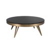 A luxury coffee table by Eichholtz with a bevelled black glass top and brushed brass finish 