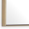 Striking and simple mirror with brass frame