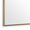Sleek and contemporary design dressing mirror with brushed brass frame