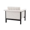 A luxurious accent chair by Eichholtz with a wooden black frame and Lyssa Off-White upholstery