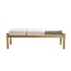 A glamorous bench by Eichholtz with two dreamy boucle cream upholstered seats and a beautiful brushed brass finish