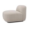 A sumptuous chair by Eichholtz with a lovely boucle cream upholstery and a contrasting black base