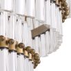 A spectacular, Art Deco chandelier by Eichholtz with five tiers, an antique brass finish and clear glass tubes