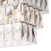 A luxurious rectangular chandelier by Eichholtz with a glamorous crystal glass fitting and nickel finish 