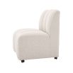 A luxurious dining chair by Eichholtz with a bouclé cream upholstery and deep channel stitching