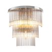 An elegant clear glass and polished nickel wall lamp