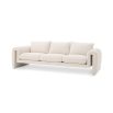 A unique and distinctive sofa by Eichholtz with a bouclé cream upholstery and free flowing shape