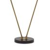 Flexible floor lamp in an antiqued brass finish.