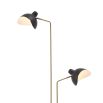 Flexible floor lamp in an antiqued brass finish.