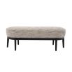 A luxurious bench by Eichholtz with a Mademoiselle beige upholstery and a black finished base