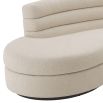 A sumptuous and curvaceous natural linen sofa by Eichholtz 