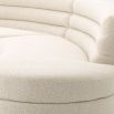 A dreamy boucle cream curvaceous sofa by Eichholtz 