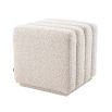 A boucle cream stool with deep channel stitching fit for any modern decor