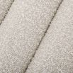 A boucle cream stool with deep channel stitching fit for any modern decor