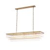 A captivating, Art Deco inspired chandelier by Eichholtz with three levels of clear glass rods and an antique brass finish