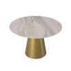 A glamorous Dining Table by Eichholtz with a round white ceramic marble top and tapered brushed brass base