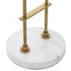 A luxurious floor lamp by Eichholtz with an antique brass base finished with a circular white marble plinth and off-white shade