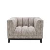 beautifully upholstered beige armchair