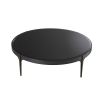 A sophisticated coffee table by Eichholtz with a round black bevelled glass top, bronze frame and brass accents on it's tapered feet