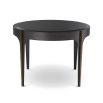 A gorgeous dark side table with a bevelled glass top with bronze and brass elements