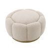 A stunning floral inspired ottoman with a curvilinear shape, a glamorous brushed brass swivel base and a luxurious boucle cream upholstery with deep channel stitching