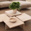 Elegant and glamorous low coffee table in travertine finish